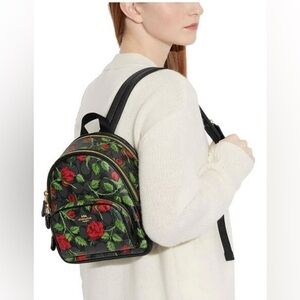 Mini Coach Black Backpack with Red Floral Design